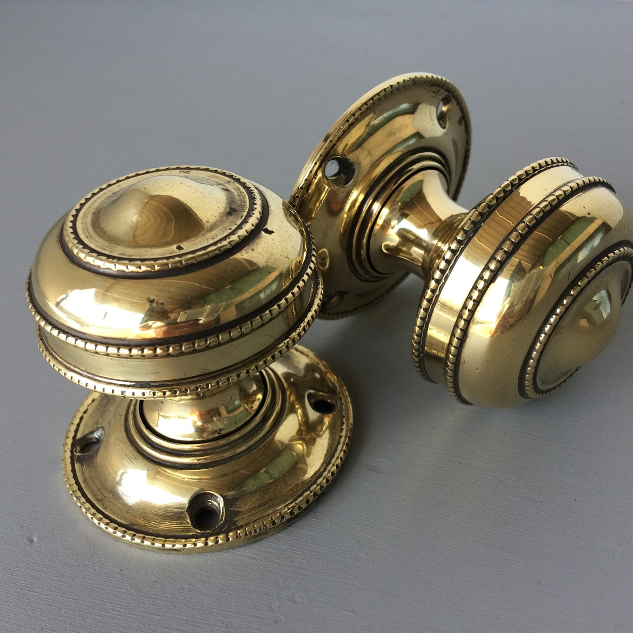 *SOLD* A pair of very decorative heavy brass door knobs / door handles