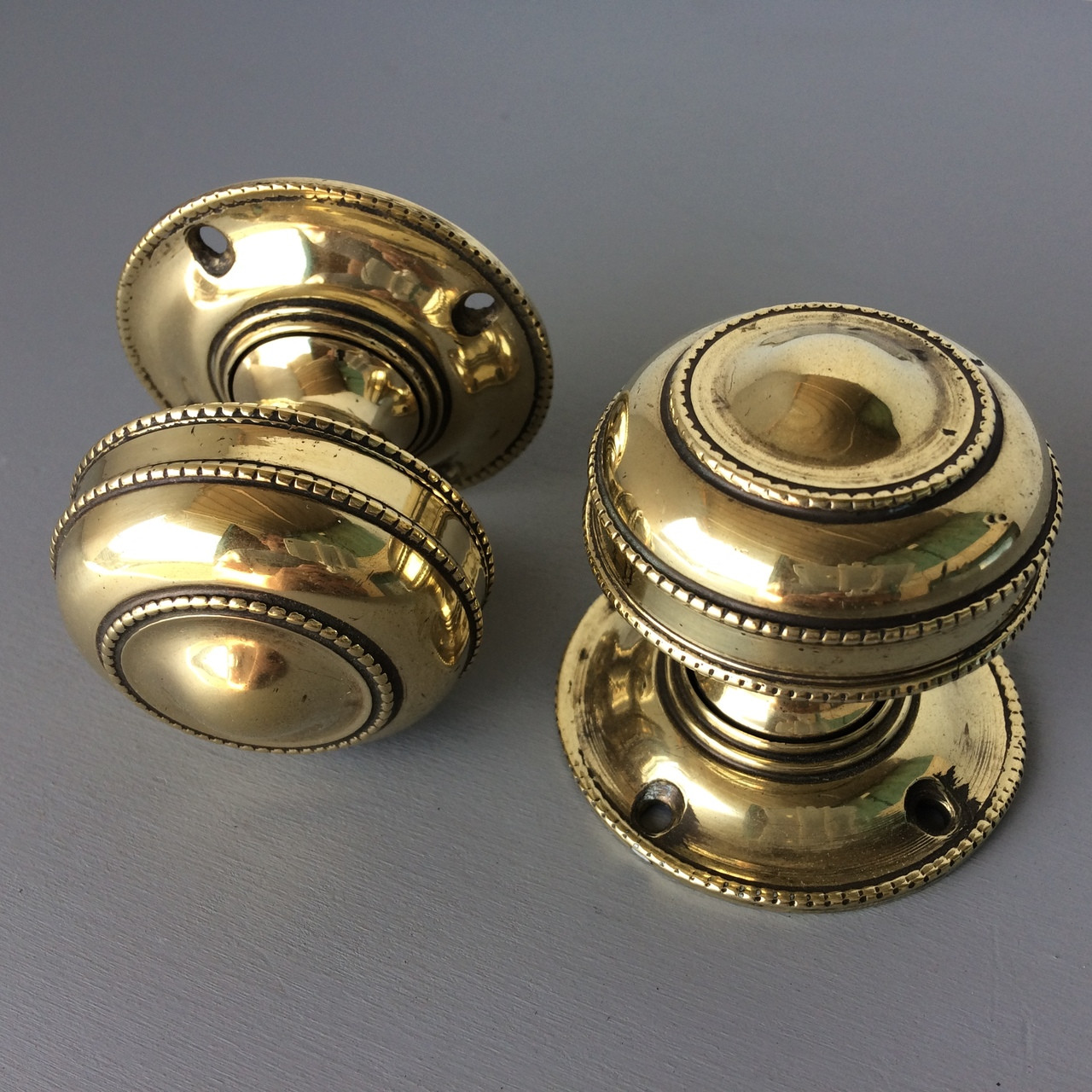 *SOLD* A pair of very decorative heavy brass door knobs / door handles