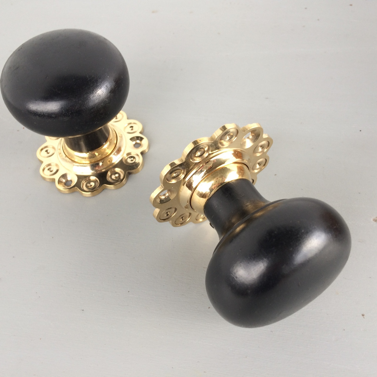 **SOLD OUT ** A pair of ebonised & brass Victorian style reproduction