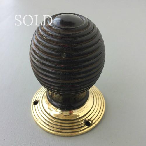 *SOLD* Original single  Victorian Beehive hardwood door knob with brass collar.