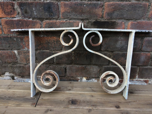 A pair of large vintage decorative metal brackets. ( Very heavy !)