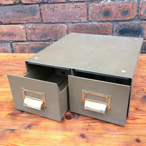 This very heavy, lovely vintage metal index card box is a brilliant desk top size.  Super faded brass handles compliment the unusual olive green colour.