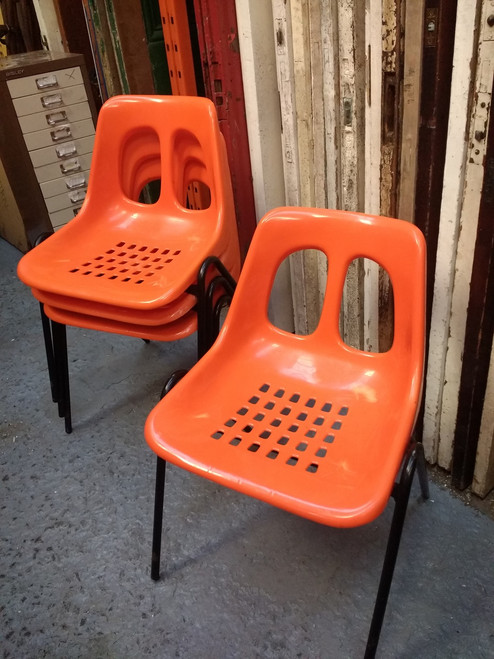 These would make a great addition to a kitchen or office if you want to brighten up a space.  Made by KM, Chesterfield Chairs, England, these chairs are vintage & made from plastic with black painted metal legs.  The chairs have 2 perforated holes on the moulded back and 30 perforated holes on the seat.  These would make a great addition to a kitchen or office if you want to brighten up a space.  Made by KM, Chesterfield Chairs, England, these chairs are vintage & made from plastic with black painted metal legs.  The chairs have 2 perforated holes on the moulded back and 30 perforated holes on the seat.