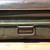 A dark olive green vintage metal trunk