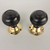 A pair of ebonised & brass Victorian London style reproduction turned door handles. (DK015)