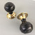 A pair of ebonised & brass Victorian London style reproduction turned door handles. (DK015)
