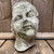 Intriguing composite case stone head - perfect decorative item for indoors or outdoors.  Size approximately H 20 cm x W 13 cm X D 17 cm. Intriguing composite case stone head - perfect decorative item for indoors or outdoors.  Size approximately H 20 cm x W 13 cm X D 17 cm.