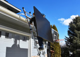 Easily transport solar panels up ladders with the Solar Panel Caddy.