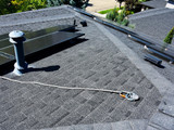 Permanent roof anchor for asphalt shingle roof that is OSHA Compliant, ANSI Compliant, UL Compliant
