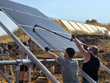 Extend your reach out over panels to tighten mid clamps on a ground mount array.