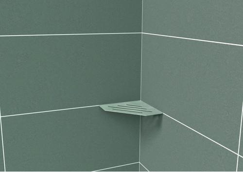 A Genesis Stainless Steel Diamond Shelf used in a tiled shower