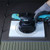 Beater Board for BIHUI Vibration Tile Beater being used to remove air bubbles from tile adhesive