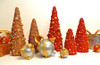 cast stone concrete hand sculpted decorative set of three christmas trees. These cone ornament trees from Athena Garden are strong and durable for the wintery holiday conditions. indoor and outdoor holiday Christmas decor made in the USA.