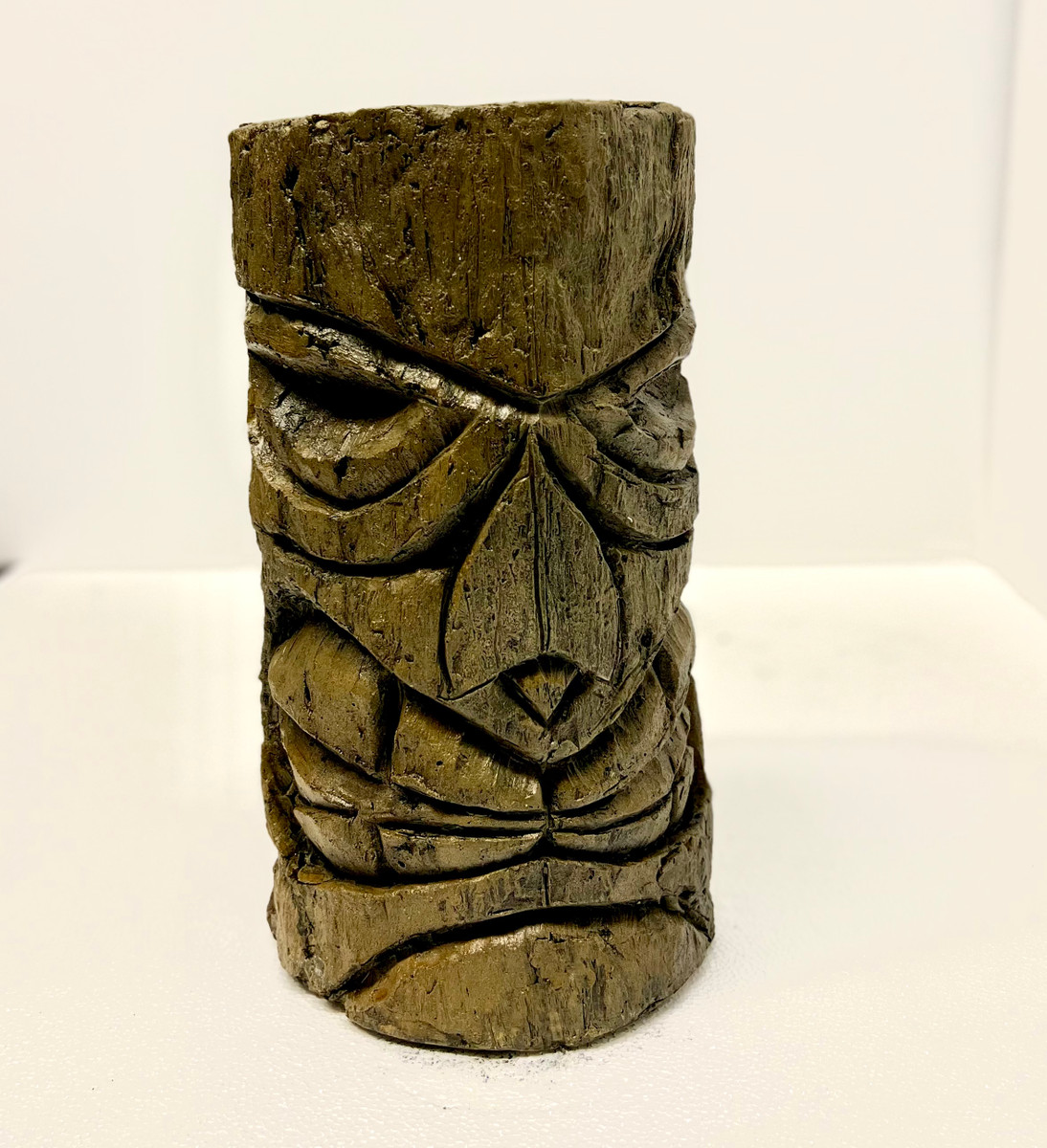 Hand sculpted cast stone tiki from Athena Garden is a rustic tiki sculpture, manufactured in a cast stone concrete. This uniquely designed tiki statue is suited for many decor settings. Tiki bar, beach, poolside setting, or just as garden decor in your outdoor landscape. This tiki man is designed and made right here in the USA.
