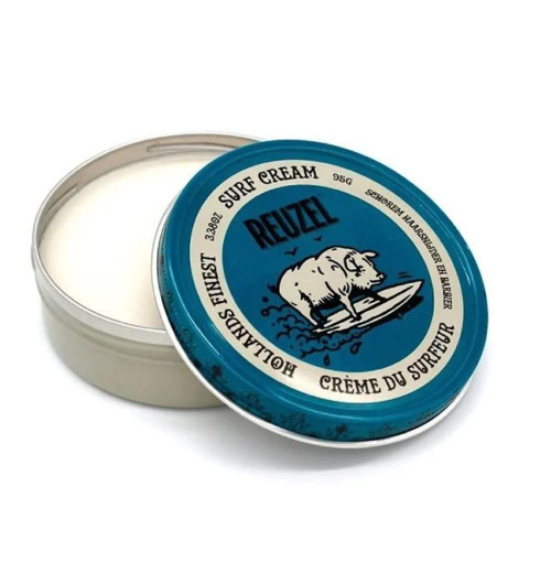 Reuzel Surf Cream 95g, tin container with blue and white packaging featuring a pig surfing on a wave, ideal for surf hairstyle styling and finishing.