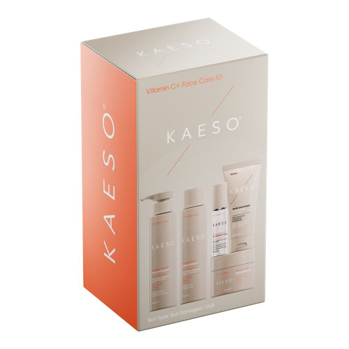Kaeso Vitamin C+ Energising Face Care Kit, skincare product set for sun damaged or dull skin in white and orange packaging.