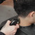 Wahl Cordless Magic Clip Clipper Black in use on hair