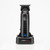 BaByliss Pro BaByliss Lo-ProFX Compact Trimmer, cordless grooming tool with a sleek black design and detachable blade, placed on its charging station.