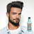 Reuzel Hair Tonic, product image showing a bottle of Reuzel Hair Tonic next to a man with styled dark hair and beard.