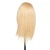 Pivot Point Gwyn Solid Cap - 100% Human Hair Snap Cap (Small), front view of blonde synthetic wig on display stand.