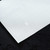 Procare PROCARE PREMIUM 247AIR AUTOMATIC HAIR FOIL DISPENSER, close-up view of the sleek, white metallic dispenser with a textured surface and a small logo at the center.