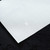Procare PROCARE PREMIUM 247AIR AUTOMATIC HAIR FOIL DISPENSER, close-up view of the sleek, white metallic dispenser with a textured surface and a small logo at the center.