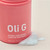 Oli G Atomic Hair Repair Leave-In – 59 ml bottle and product texture, close-up
