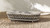 Everly 43.5" Oval Woven Patio Coffee Table, Light Beige