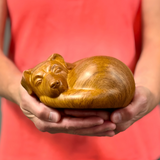Sleeping Dog Pet Urn in a Person's Hands