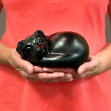 Sleeping Dog Pet Urn - Black in Hands