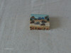 A unique, handcrafted trinket box made from camel bone, showcasing detailed miniature painting of a polo-style game.