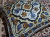 A 16x16 inch (40x40 cm) Kashmiri cushion cover featuring vibrant hand-embroidered vintage Suzani floral patterns.