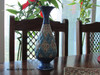 Front view of a 25 cm premium copper vase showcasing traditional hand-painted enamel Minakari diamond lattice artwork over high-gloss protective glazing.