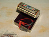 The "Miniature Masterpiece" Khatamkari box shown as a prestigious decorative accessory on a modern luxury vanity in Dubai.