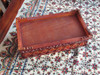 A stylish handcrafted tissue box cover that combines traditional leather carving with contemporary fabric design