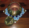 Close-up of the microscopic brass, bone, and wood triangle inlaying technique on the 17 cm luxury serving bowl.