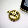 brass compass with sundial push button