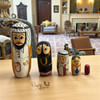 A premium 5-in-1 set of handmade Arabic wooden family dolls titled "The Desert Dynasty" featuring traditional UAE heritage designs.