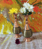 Full setting presentation of the twin traditional Khatamkari copper vases displayed elegantly as an exceptional corporate giveaway token or elite VIP milestone travel memento.