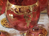 The "Ruby Court" Qajar Style Decorative Wine Set Shown As A Prestigious Centerpiece Feature In A Modern Luxury Majlis Setting In Dubai.