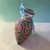 A premium 23 cm hand-enamel painted earthenware hanging vase featuring vibrant floral patterns and a high-gloss finish.