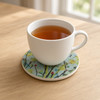 An exclusive Craftihouse 9 cm printed ceramic coaster designed to bring impressionist art and tabletop protection to luxury coffee and tea settings.