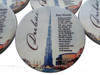 Close-up of the vibrant architectural colors and the high-gloss glazed finish on the Burj Khalifa souvenir coaster.