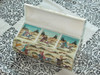 A close-up of the 3-house miniature painting on the surface of the camel bone jewelry box, highlighting the fine brushwork.