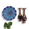 A premium 3-piece handmade Meenakari copper decor set titled "The Azure Trio" featuring a wall plate and two matching vases in blue and white enamel.