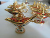 A durable zinc alloy genie lamp perfect for small gifts and cultural collections from Dubai.