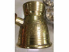 Close-up of the secure riveted connection between the brass body and the dark natural wooden handle.
