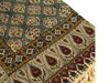 An elegantly displayed 100x100 cm Ghalamkari table cover, perfect for adding heritage charm to your dining space.