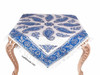 A detailed close-up highlighting the soft cotton weave, rich blue tones, fine hand-printed patterns, and traditional fringe of the block-printed table cloth.