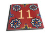 A professional product presentation of the custom ceramic house number tile from a premier UAE art, gift, and home decor supplier.